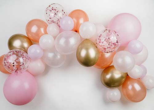 Pink and gold balloon arch decoration.