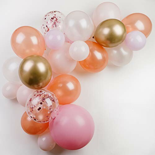 Balloon garland with pink, gold, and white balloons.