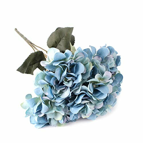 Artificial blue hydrangea bouquet with green leaves.