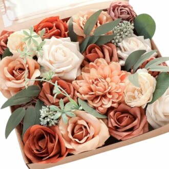 Box of artificial flowers in various colors