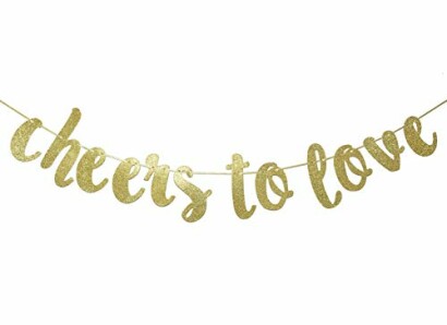 Gold glitter banner with text 'cheers to love'