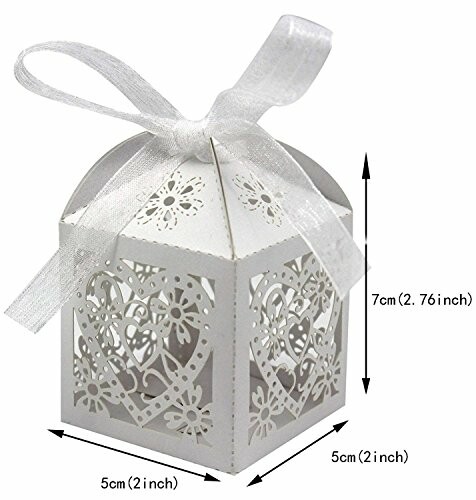 White decorative gift box with ribbon and heart pattern