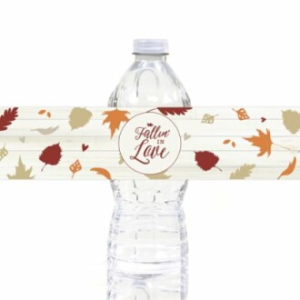 Water bottle with fall-themed label featuring leaves and 'Fall in Love' text.