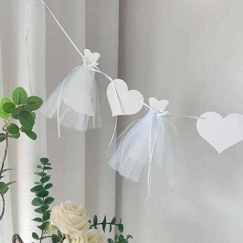 Decorative garland with paper hearts and angels.