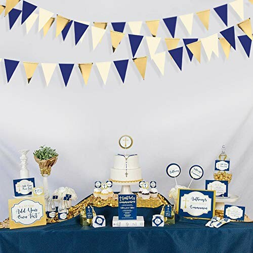 Navy and gold themed party decorations with cake and banners. Perfect for themed parties.