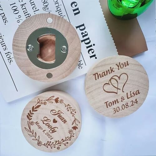 Personalized wooden bottle openers with engraved names and date.