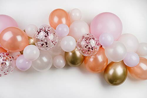 A decorative garland of pink, gold, and white balloons.