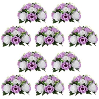 Collection of purple and white rose bouquets with green foliage.