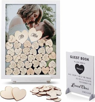 Wedding heart guest book with wooden hearts and couple photo.