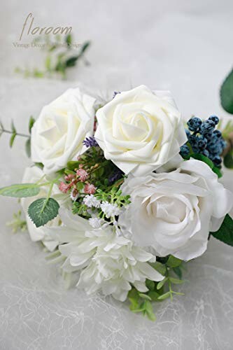 White rose floral bouquet with greenery