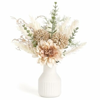 White vase with dried flowers arrangement